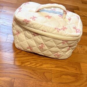 Quilted Cream Cosmetic Bag with Pink Bow Print